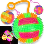 ŚWIECĄCA PIŁECZKA SENSORYCZNA Z GUMKĄ ANTYSTRESOWA PIŁKA PISZCZĄCA ŚWIECI